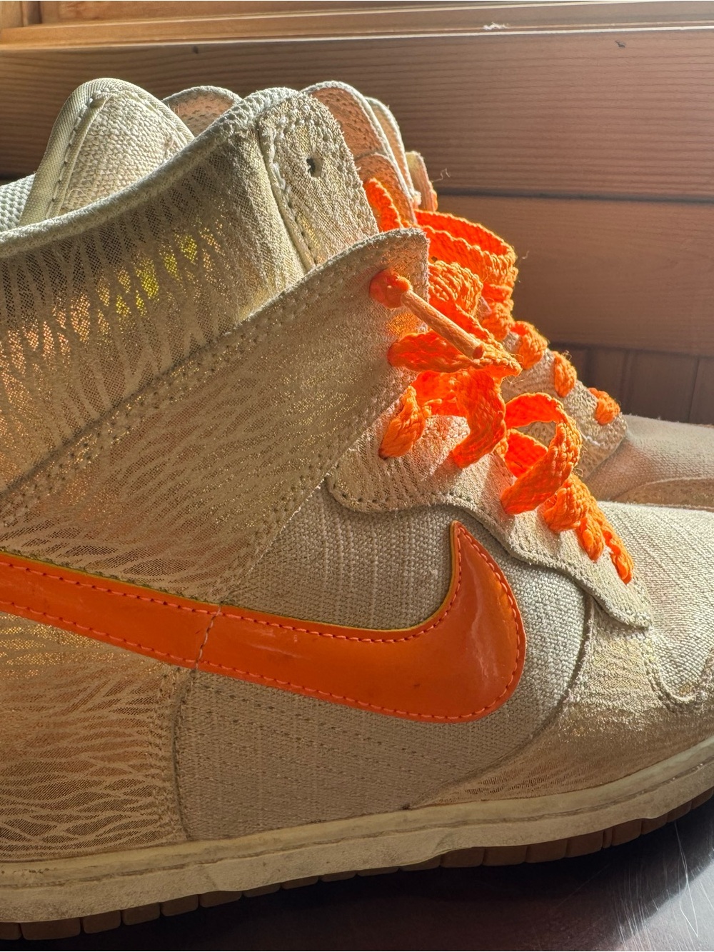 Nike Women’s Cream High-Top Sneakers with Bright Orange Swoosh
